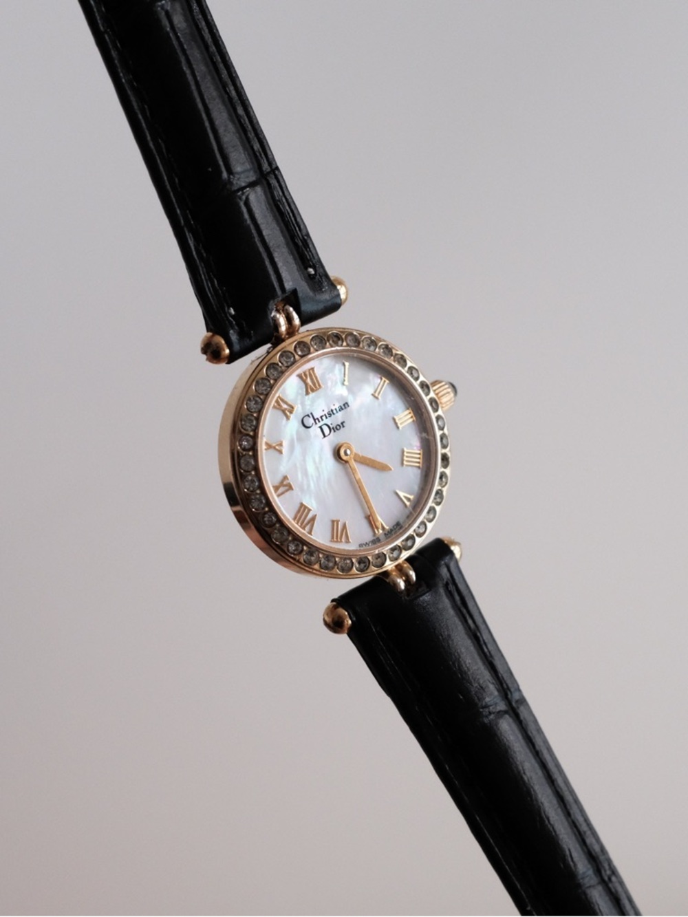 Dior Gold-Tone Crystal Bezel Watch with Black Leather Strap